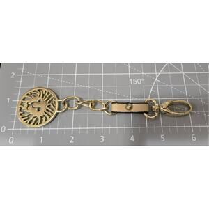 Ann Klein lion cutout medalion 1 1/2 in. leather 6 in. long